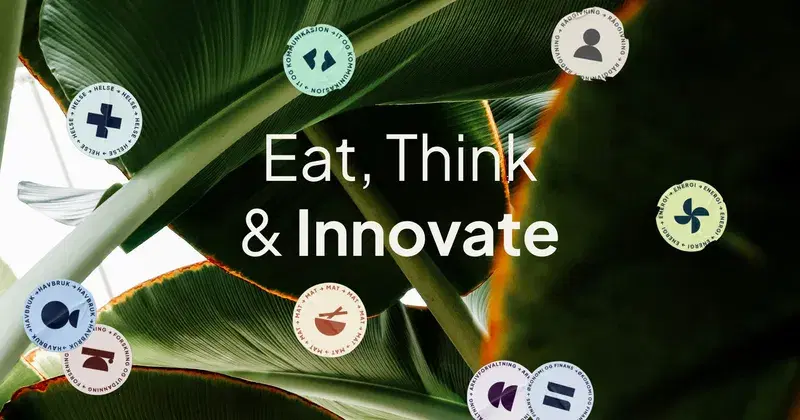 Grønne, store blader, med teksten Eat, Think &amp; Innovate. Runde merker som illustrerer alle bransjene som er representert i Innovasjonsparken.
